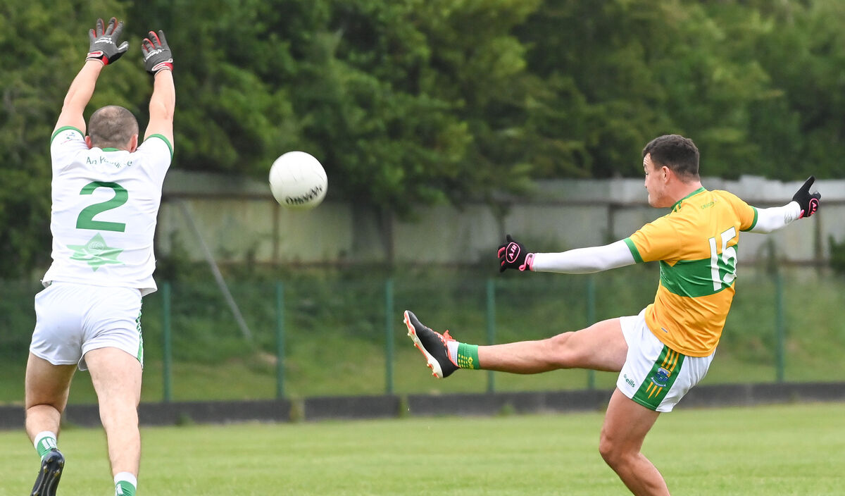  Glanmire's David McCarthy kicks a point past. Picture: David Keane