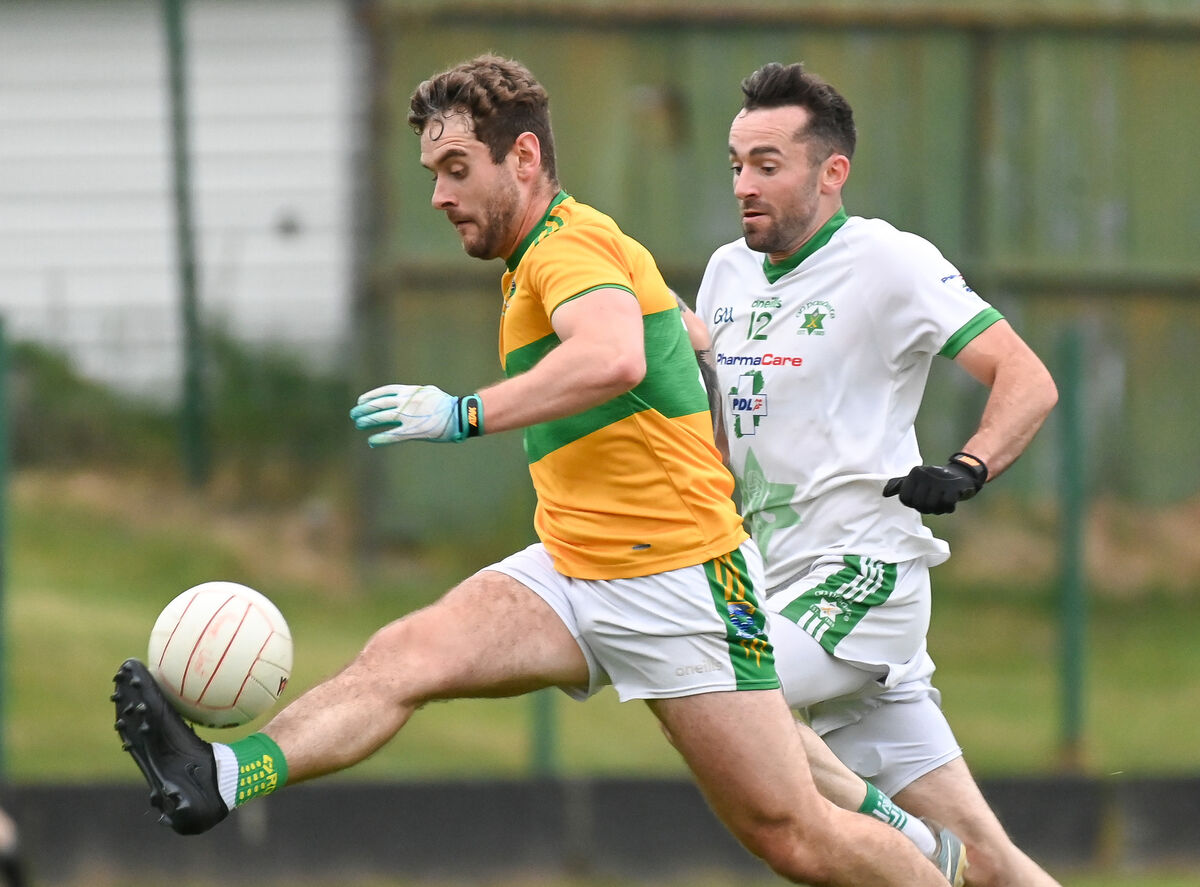  Glanmire's David O'Brien tries to get away from Passage's Shane Burke. Picture: David Keane