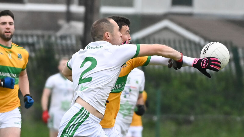 Passage footballers withstand Glanmire fightback to take league title