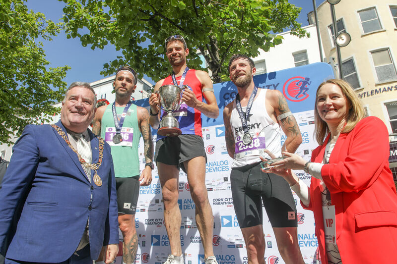 Lord Mayor of Cork, Cllr. Dan Boyle with the winners, Michael Fox (2nd) Chris Jeuken (winner) Stephen McAuley (3) and Fiona Treacy at the prize presentation the Cork City Marathon in Cork City. Picture: David Creedon