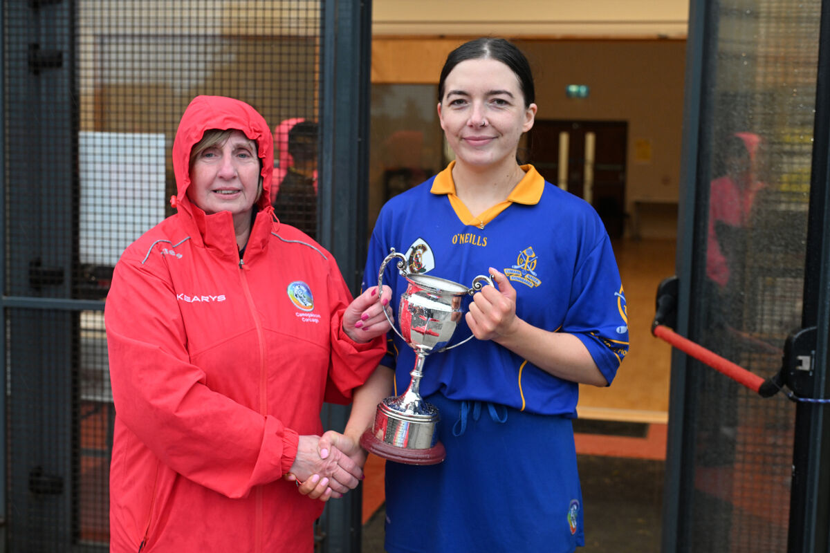  Mary McSweeney presenting the trophy to Stephanie Punch of St Finbarr's. Picture: Dan Linehan