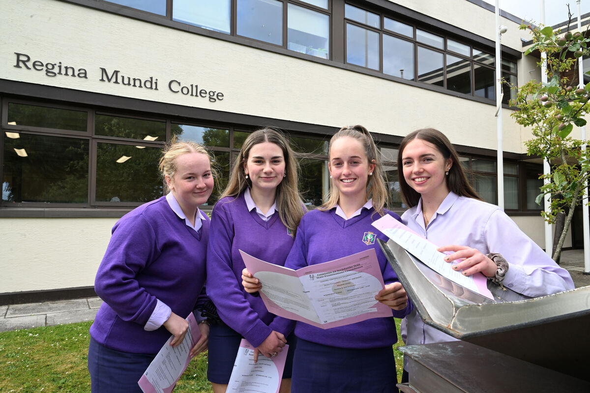 Ava Hourihan, Grace Madden, Jess Murphy and Fódla Ní Brádaigh look over the home economics exam paper after the examination at Regina Mundi College, Douglas, Cork. Picture: Larry Cummins