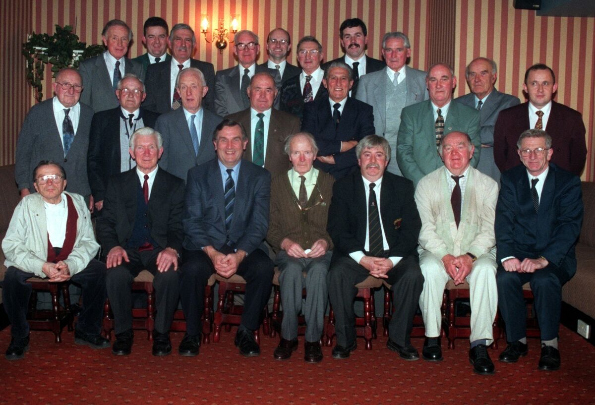 members of the Na Piarsaigh team from 1946 who won the first adult trophy, with Denis O'Neill, then club chairman, included. Picture: Eddie O'Hare