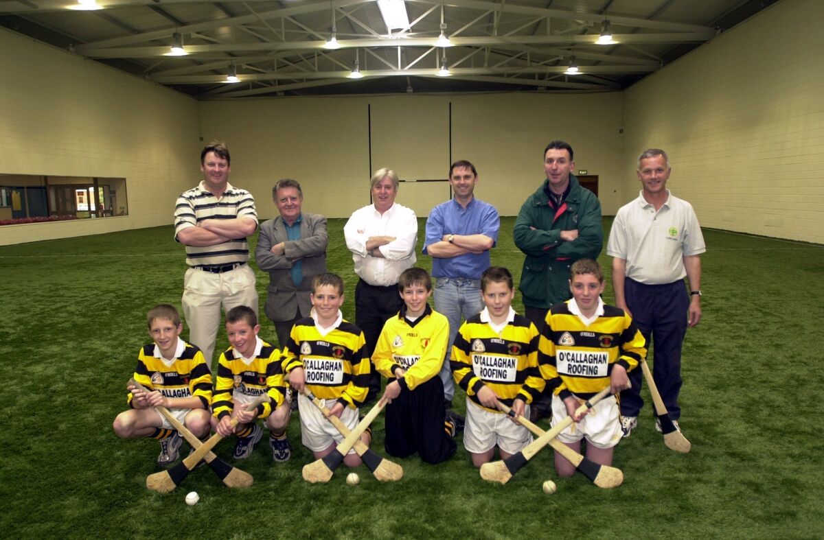 Na Piarsaigh officers Donncha O'Leary PRO, Abe Allen, under age coordinator, Denis O'Neill, chairman, Dominick Keohane, registrar, Bill Kelleher, secretary, and Jim O'Sullivan, under age coach, with members of the U13A team - James O'Rourke, David Carroll, Alan Corcoran, Patrick Hayes, Barry O'Brien and Darragh Hannafin, when they opened the indoor sports area. I Picture: Richard Mills.