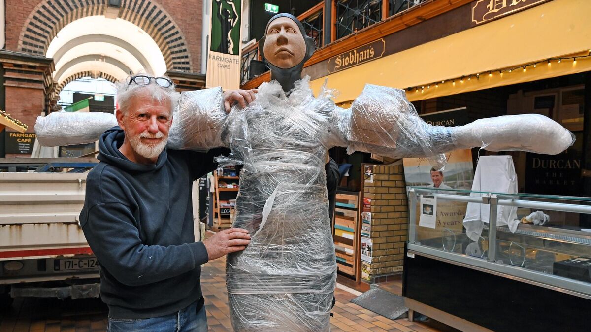 Artist Michael Quane from Coachford with his sculpture 'Carbon Sync' in the English market. Picture: Eddie O'Hare Artist Michael Quane from Coachford with his sculpture 'Carbon Sync' in the English market. Picture: Eddie O'Hare