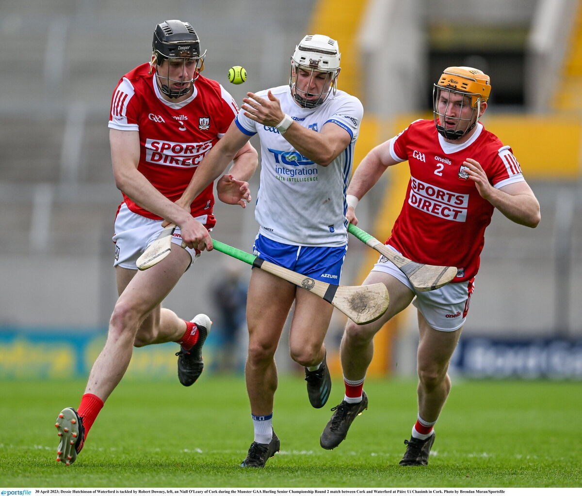 Cork defenders Robert Downey (left) and Niall O'Leary, seen here against Dessie Hutchinson of Waterford, are both named on the bench. Picture: Brendan Moran/Sportsfile