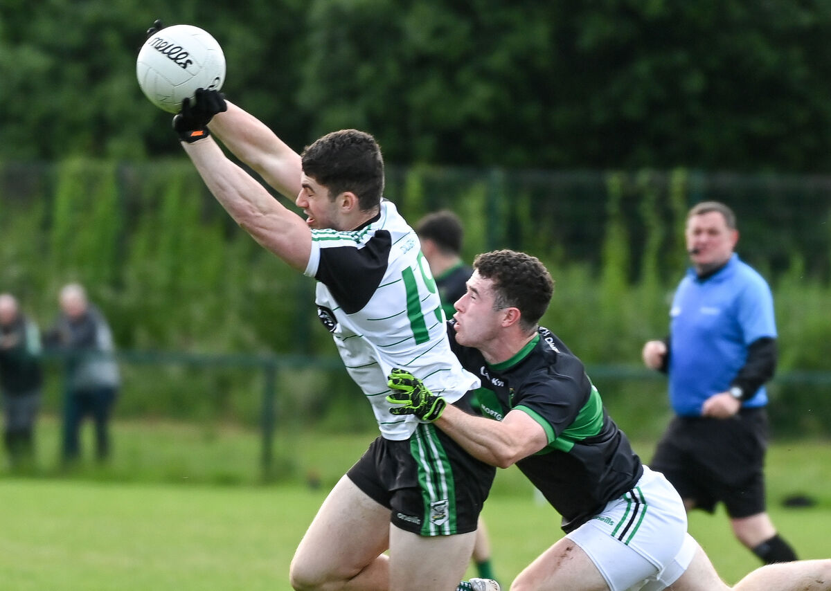  Douglas' Chris O'Keeffe is tackled by Nemo Rangers' Daniel Quinn, during their SFL clash at Douglas. Picture: David Keane