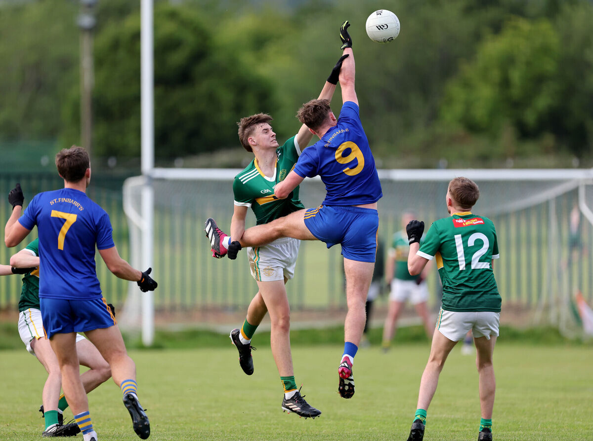  Kyle Leahy, St Michael's, battles for the high ball with Ciaran Doolan, St Finbarr's. Picture: Jim Coughlan.