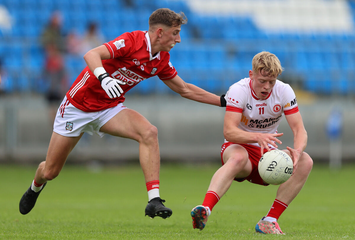 Cork’s Ronan Hayes tackles Peter Colton of Tyrone. Picture: INPHO/Leah Scholes