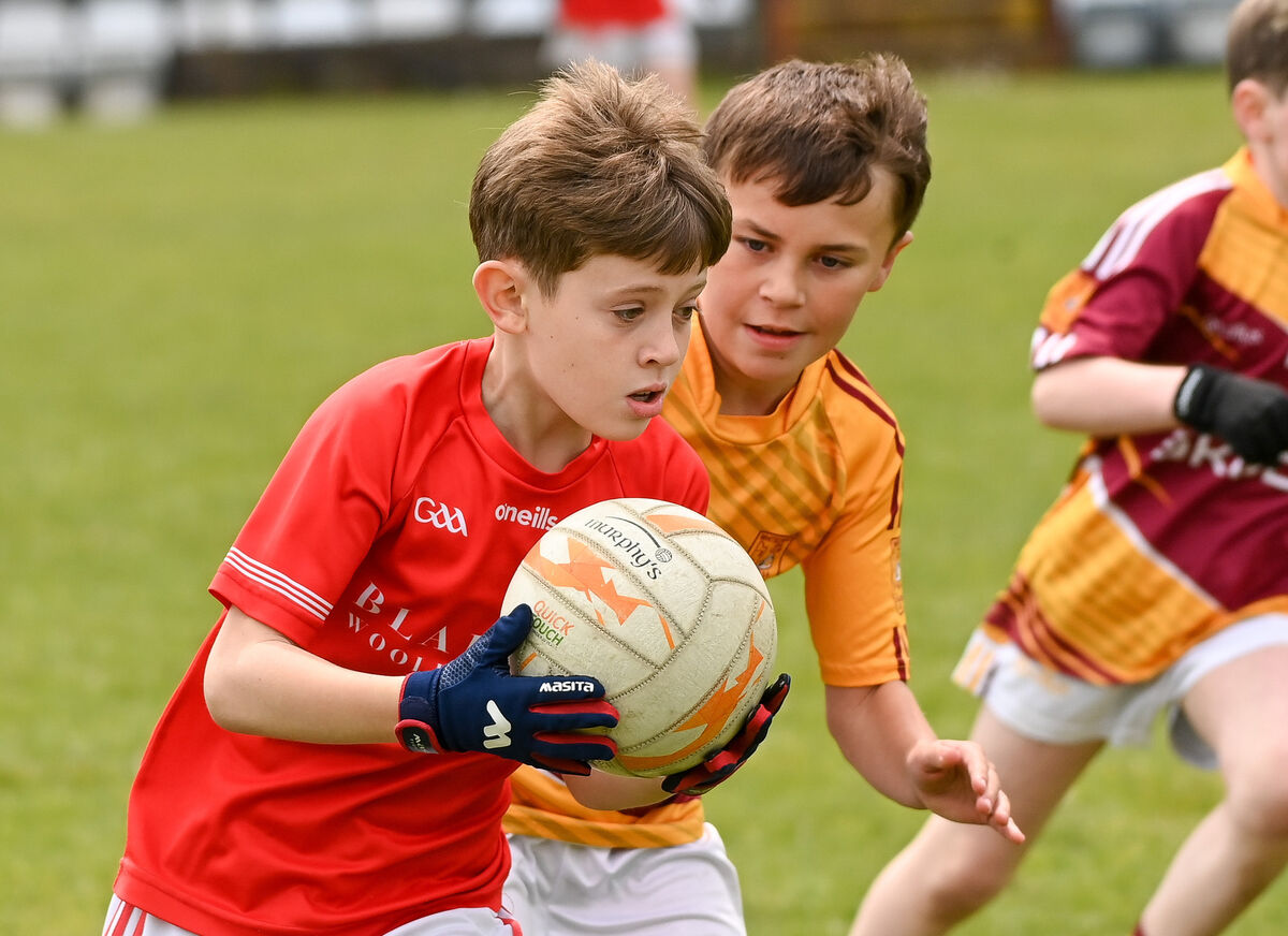  Blarney's Tom O'Keeffe takes on  Cillain McCarthy of Whitechurch, during the John Kerins Memorial Tournament Shield final. Picture: David Keane