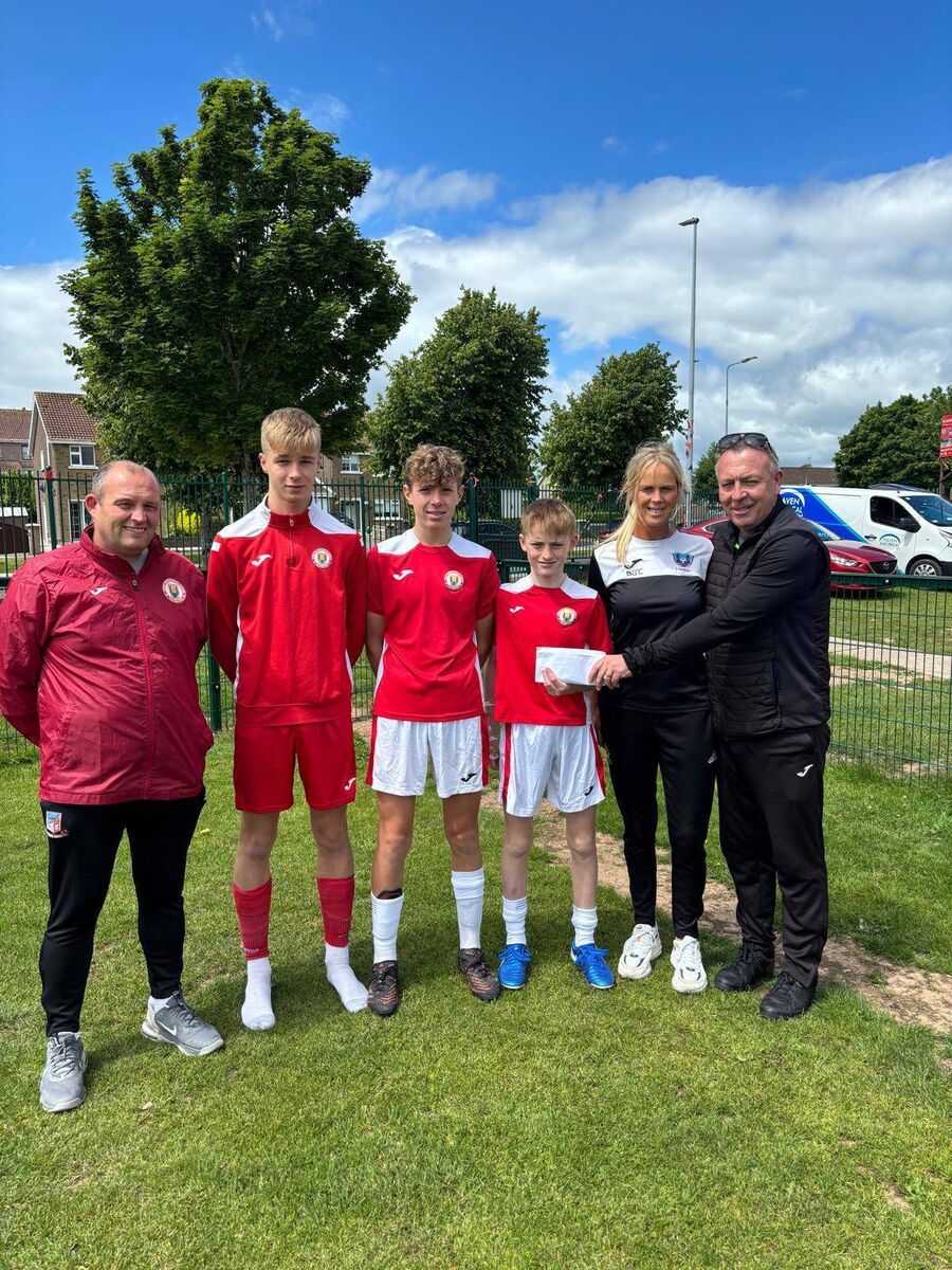 Ivan Bevan presenting a donation of funds raised from the Kieran Dunlea Memorial Game to the Kennedy Cup panel and management: Paul Higgins, Sean Hogan, Sean Dollard, Kieran Stack and Barbara O’Connell.