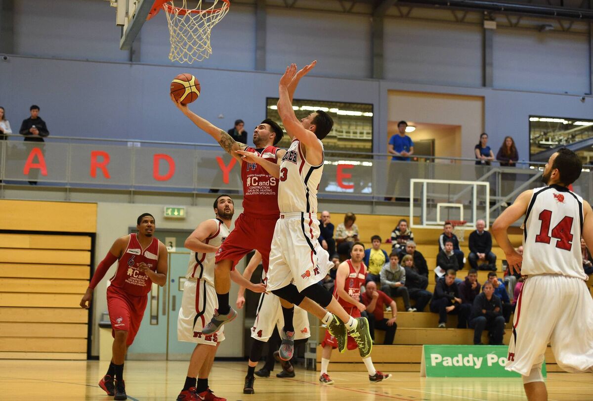 C&amp;S UCC Demons forward Niall Murphy rises to score a basket against Swords Thunder at the Mardyke.