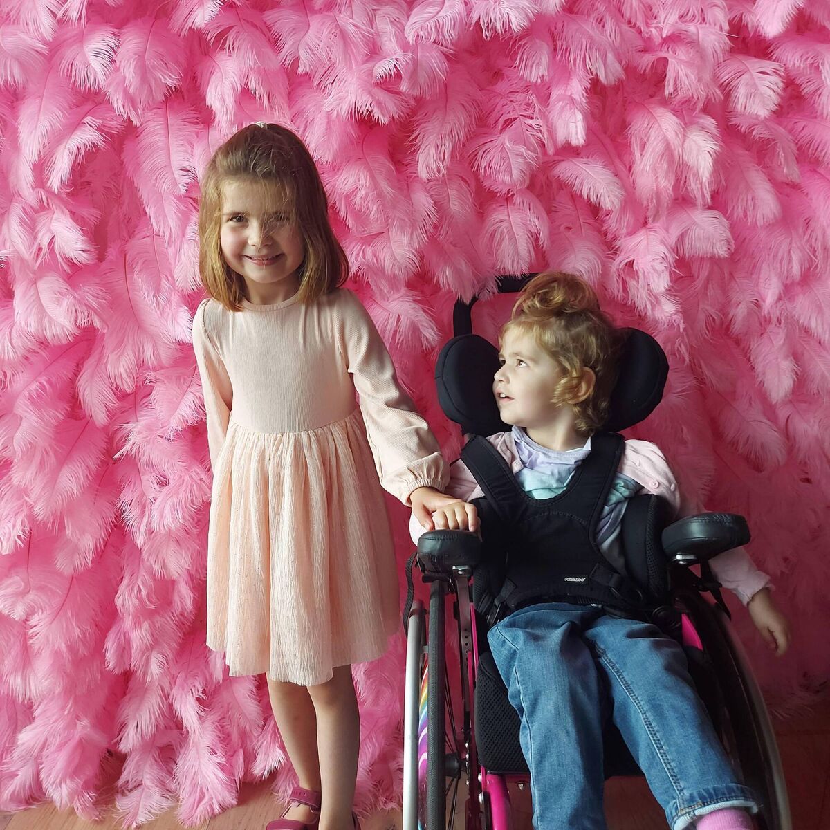 Gwen (left) with her younger sister Grace. "Gwen adores Grace," says Elizabeth. 