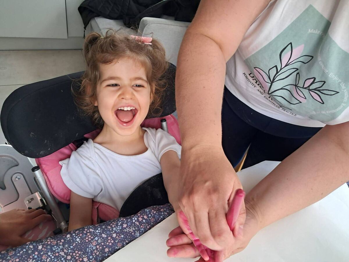 “Grace loves lights and music,” says Elizabeth. “She responds to lights and music. She loves being tickled.”