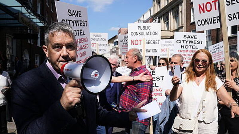 Row breaks out at protest over Government plans to buy CityWest Hotel Row breaks out at protest over Government plans to buy CityWest Hotel