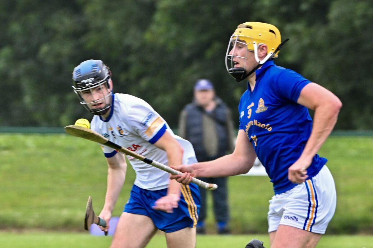  St Finbarr’s Cathal O'Crowley gets away from Carrigaline's Nathan O'Keeffe. Picture Chani Anderson