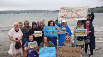 Hundreds turn out on land and at sea to protest against Kinsale mussel farm