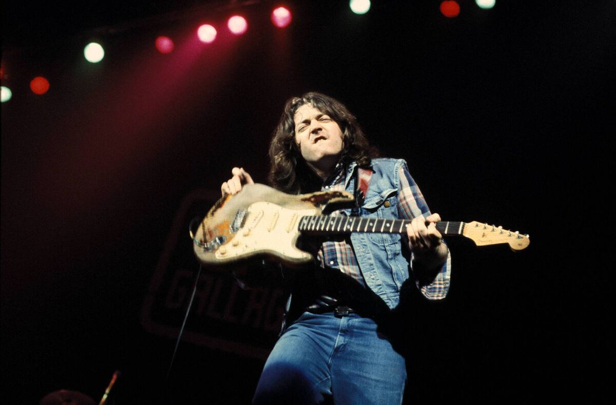 Rory Gallagher performing with Taste in Belfast on New Year’s Eve in 1970 Picture: Fin Costello/Redferns. Rory Gallagher performing with Taste in Belfast on New Year’s Eve in 1970 Picture: Fin Costello/Redferns.