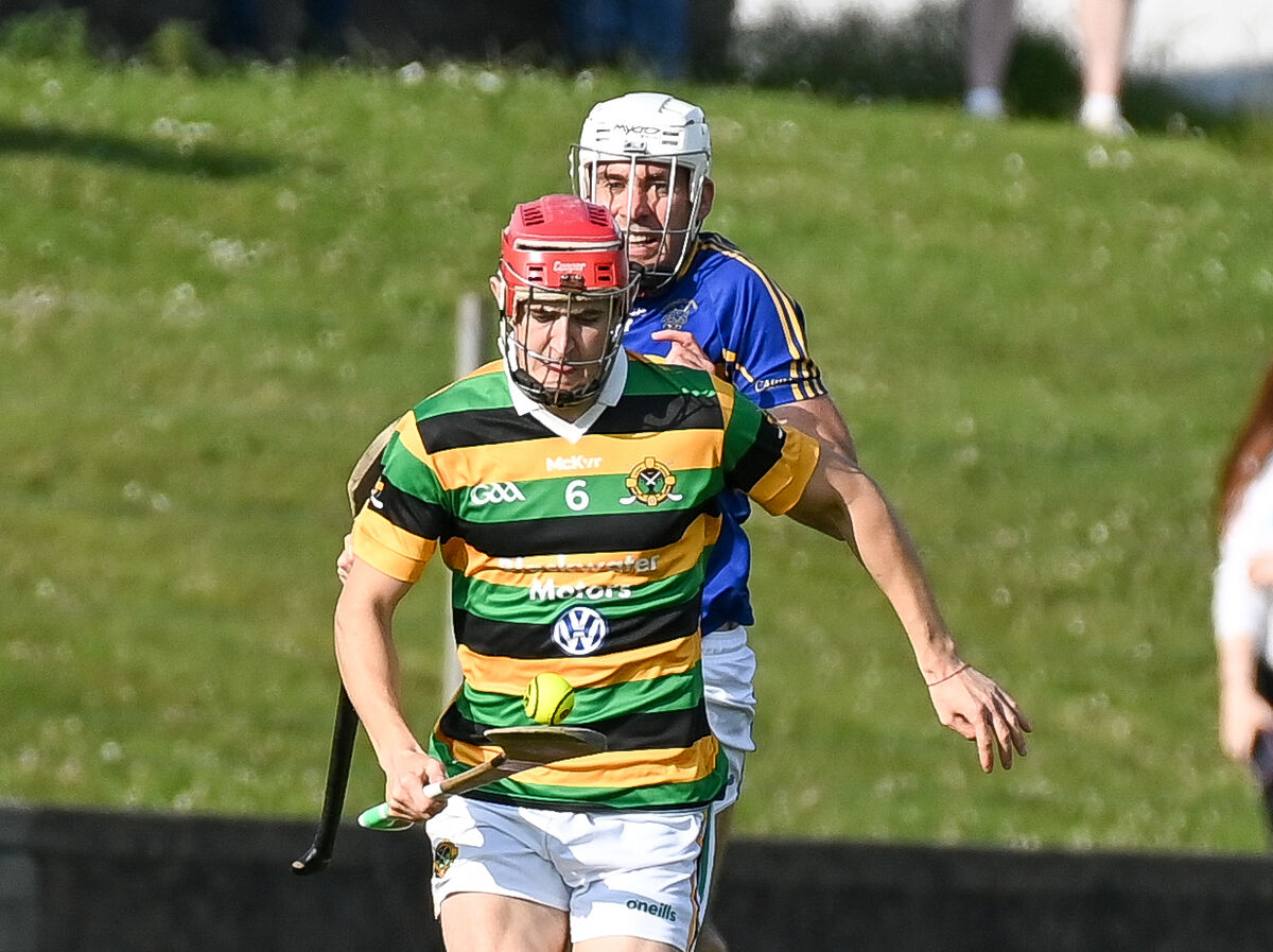  Glen Rovers' Conor McCarthy is tracked by Carrigtwohill's Tomas Hogan.