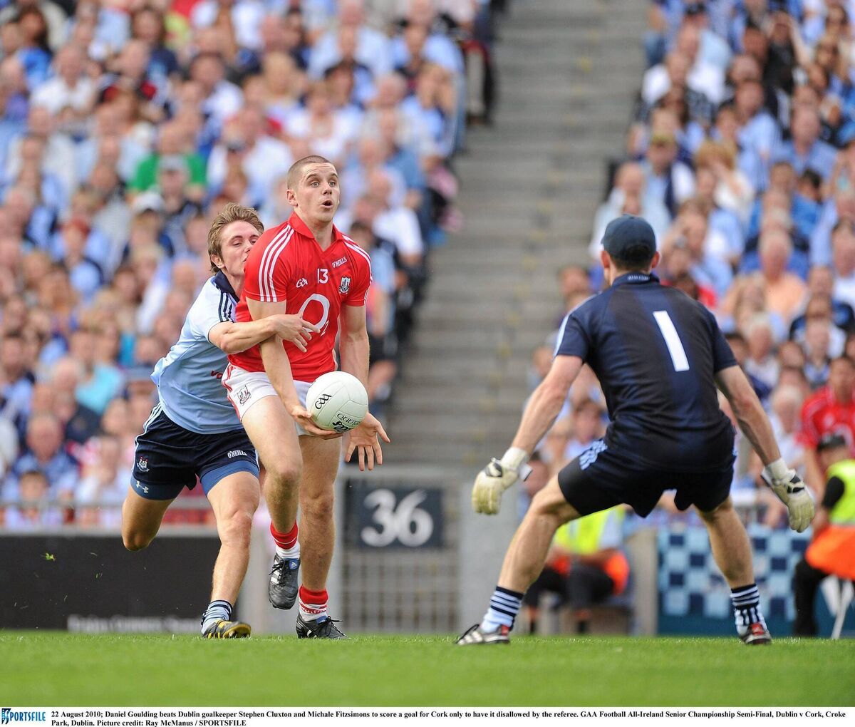 Cork's Daniel Goulding in action against Michael Fitzsimons and goalkeeper Stephen Cluxton of Dublin in 2010. Picture: Ray McManus/Sportsfile Cork's Daniel Goulding in action against Michael Fitzsimons and goalkeeper Stephen Cluxton of Dublin in 2010. Picture: Ray McManus/Sportsfile