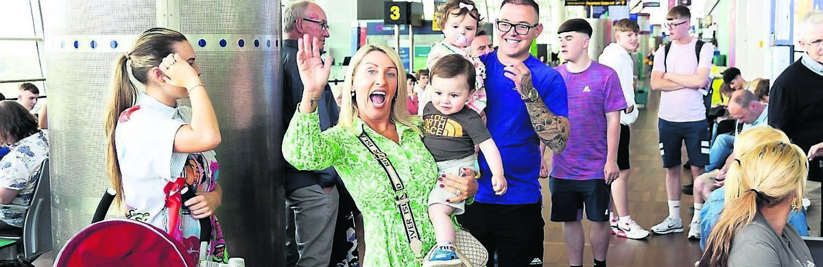Shirley Meehan with Kai Meehan, Farranree and Cian with Callie Duggan, Knocknaheeny, at Cork Airport checking-in for boarding the inaugural SunExpress service to İzmir.	Picture: Alison Miles /OSM PHOTO
                    