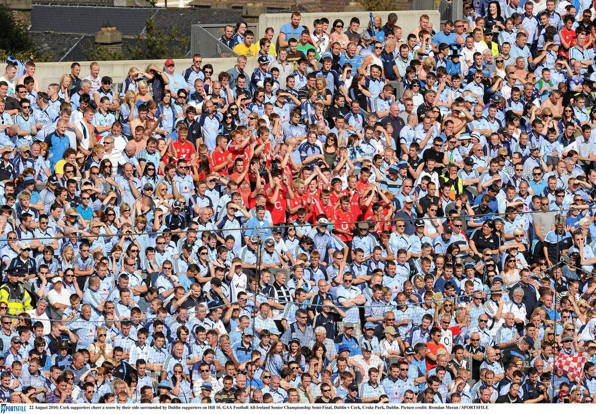 Cork fans cheer a score by their side surrounded by Dublin supporters on Hill 16 during the All-Ireland semi-final in 2010 at Croke Park. Picture: Brendan Moran/Sportsfile Cork fans cheer a score by their side surrounded by Dublin supporters on Hill 16 during the All-Ireland semi-final in 2010 at Croke Park. Picture: Brendan Moran/Sportsfile