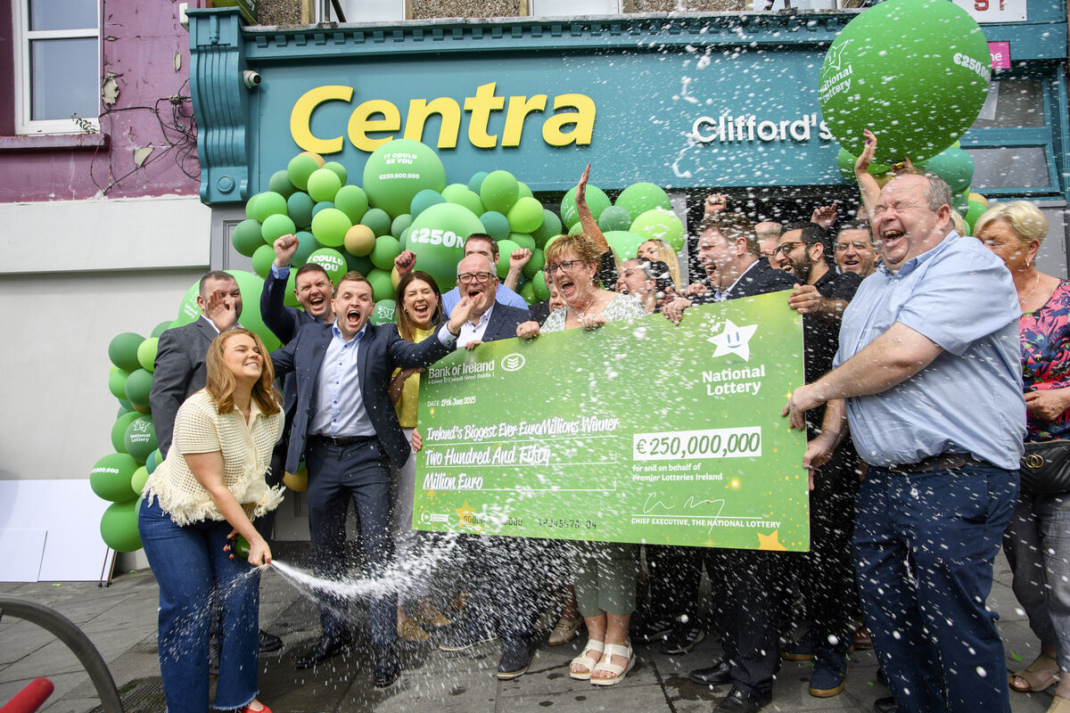 Celebrating the record-breaking €250m winning Euromillions ticket which was sold at Clifford’s Centra on Shandon Street. Picture: Daragh Mc Sweeney/Provision.