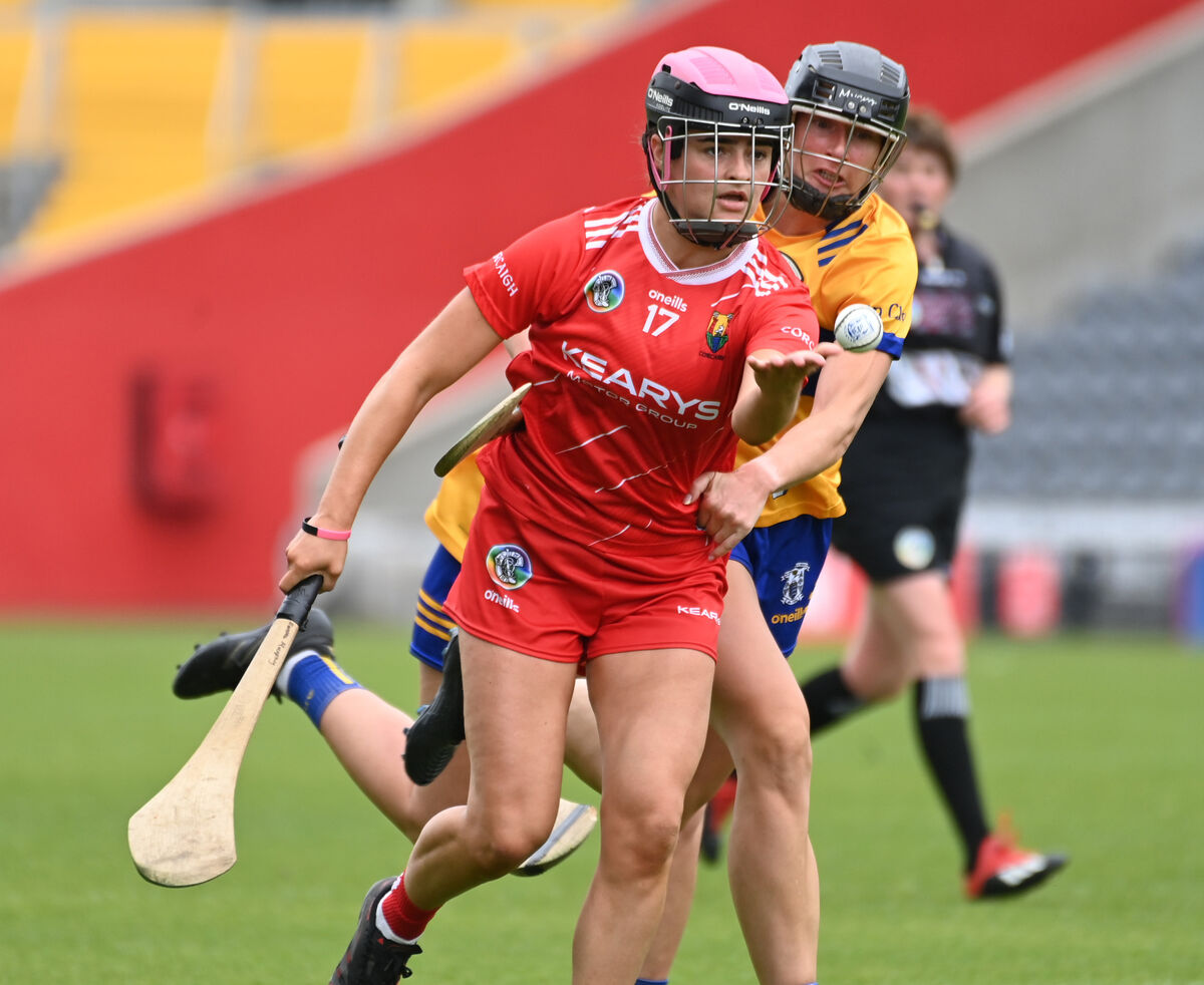 Cork's Emma Murphy gets off her pass from Clare's Sinead O'Keeffe. Picture: Eddie O'Hare