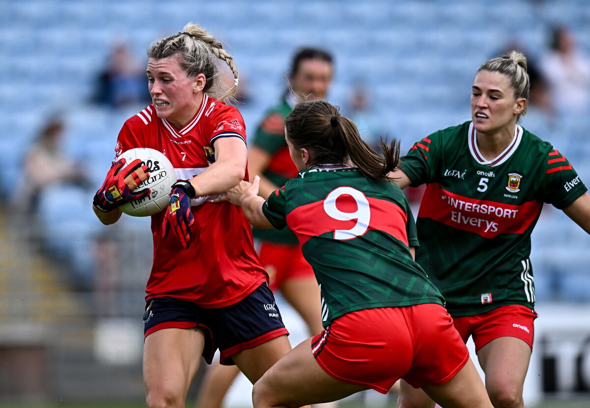Rosie Corkery of Cork in action against Mayo players Saoirse Lally and Danielle Caldwell. Picture: Piaras Ó Mídheach/Sportsfile Rosie Corkery of Cork in action against Mayo players Saoirse Lally and Danielle Caldwell. Picture: Piaras Ó Mídheach/Sportsfile