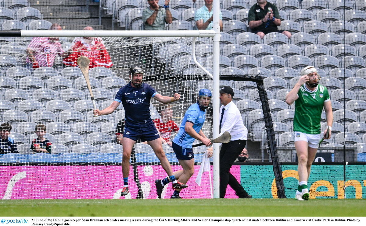Dublin goalkeeper Sean Brennan celebrates making a save against Aaron Gillane. Picture: Ramsey Cardy/Sportsfile