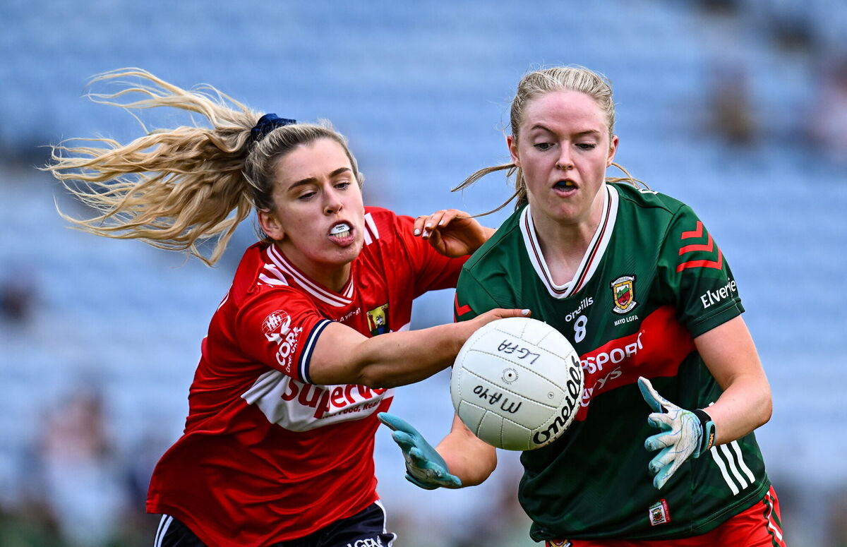 Hannah Reape of Mayo tries to hold off Máire O'Callaghan of Cork. Picture: Piaras Ó Mídheach/Sportsfile Hannah Reape of Mayo tries to hold off Máire O'Callaghan of Cork. Picture: Piaras Ó Mídheach/Sportsfile