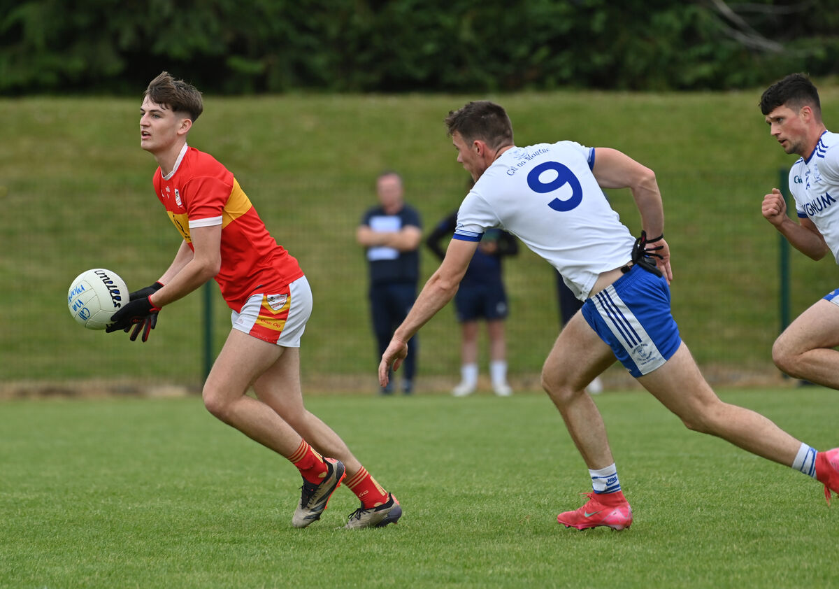 Darragh Clifford of Éire Óg breaks past Gearóid Ó Goillidhe of Cill na Martra. Picture: Dan Linehan Darragh Clifford of Éire Óg breaks past Gearóid Ó Goillidhe of Cill na Martra. Picture: Dan Linehan