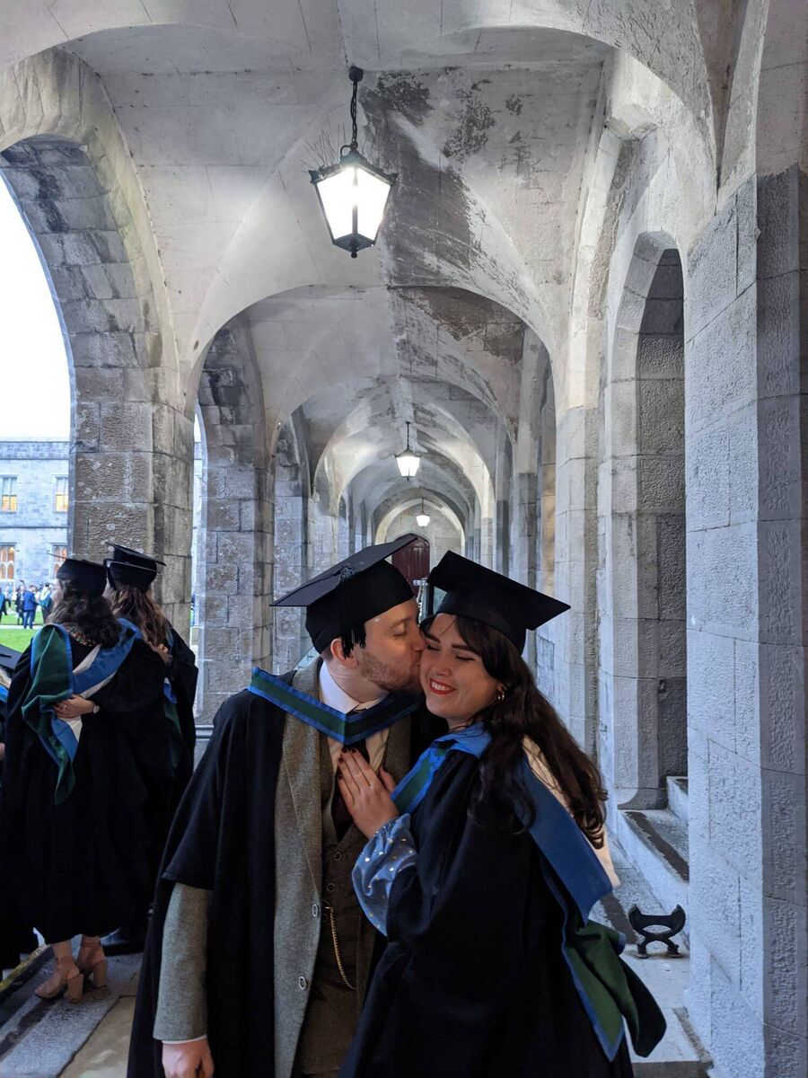 Holly and Mikey pictured at their graduation in 2022.