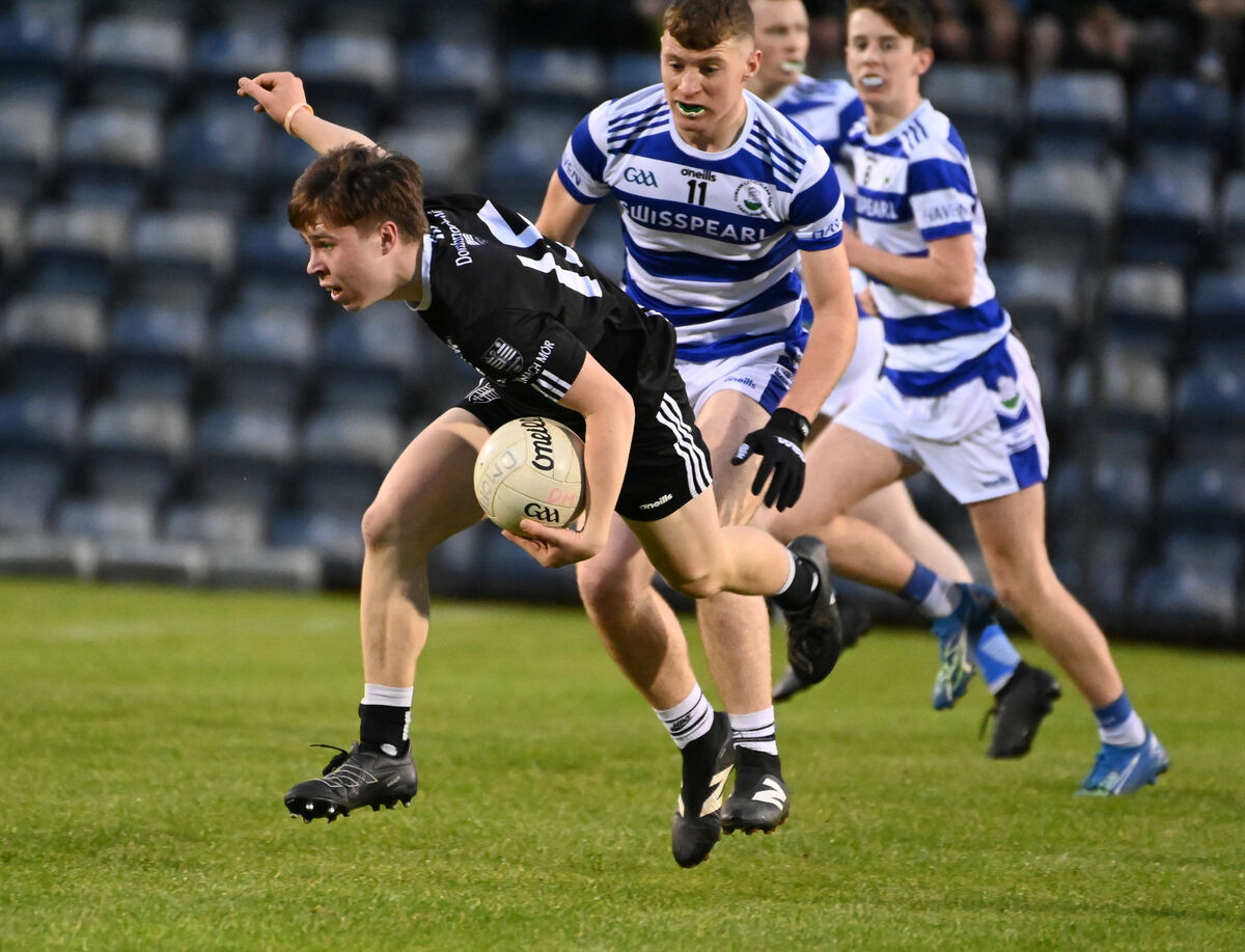 Donoughmore's David McDonnell gets past Castlehaven's Cillian French during the Rebel Óg Premier 2 MFC final at Páirc Uí Rinn last year. Picture: Eddie O'Hare
