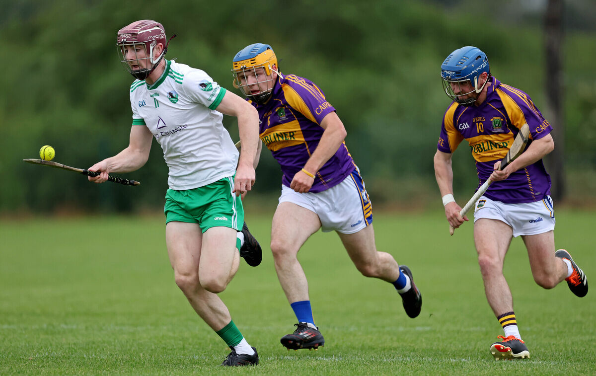 James Foley, Muskerry, moves away from Conor O'Sullivan and Jamie Lucey of Carbery. Picture: Jim Coughlan James Foley, Muskerry, moves away from Conor O'Sullivan and Jamie Lucey of Carbery. Picture: Jim Coughlan