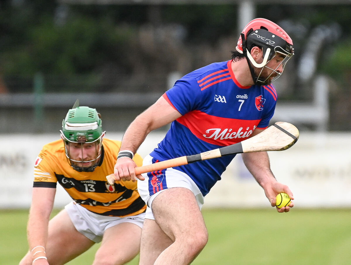 James O'Carroll of Erins Own breaks out of defence past Eoin Galvin of Na Piarsaigh. Picture: David Keane James O'Carroll of Erins Own breaks out of defence past Eoin Galvin of Na Piarsaigh. Picture: David Keane
