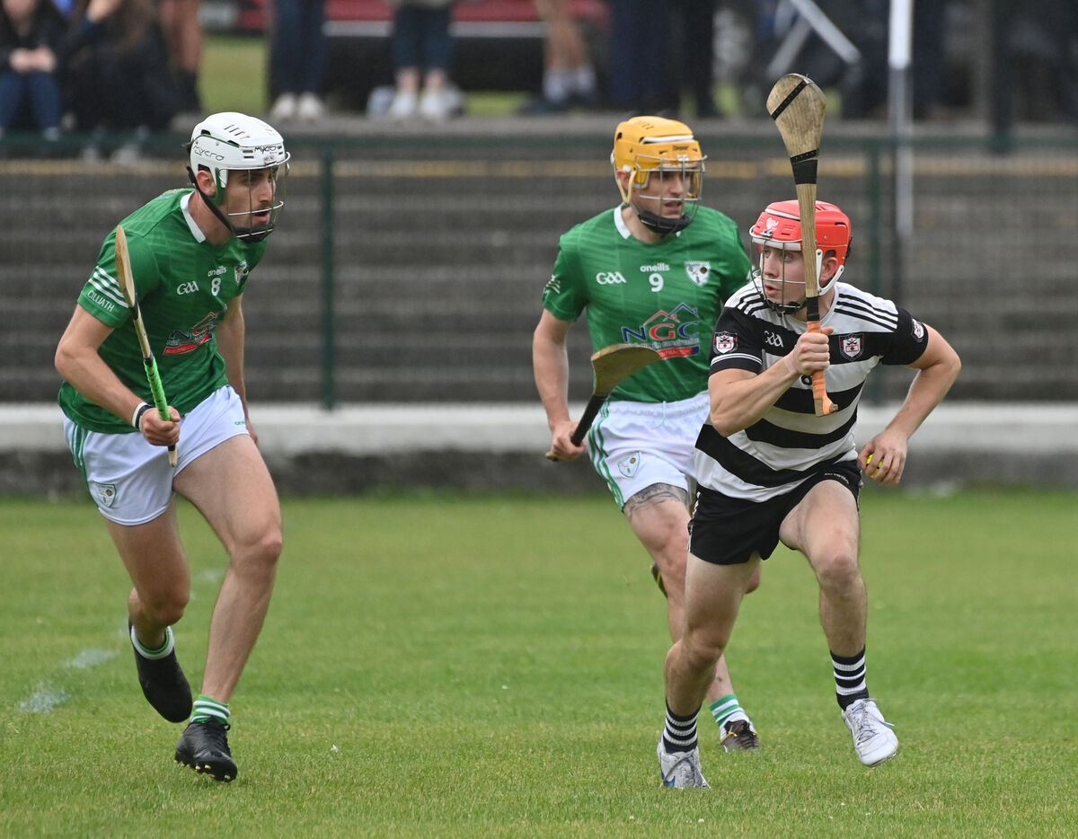  Alex Quirke, Midleton breaking away from Killeagh players Cathal Fitzgibbon and Seán Long. Picture: Dan Linehan