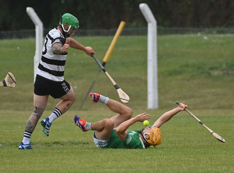  Luke Dineen, Midleton fouls Richie Long of Killeagh. Picture: Dan Linehan