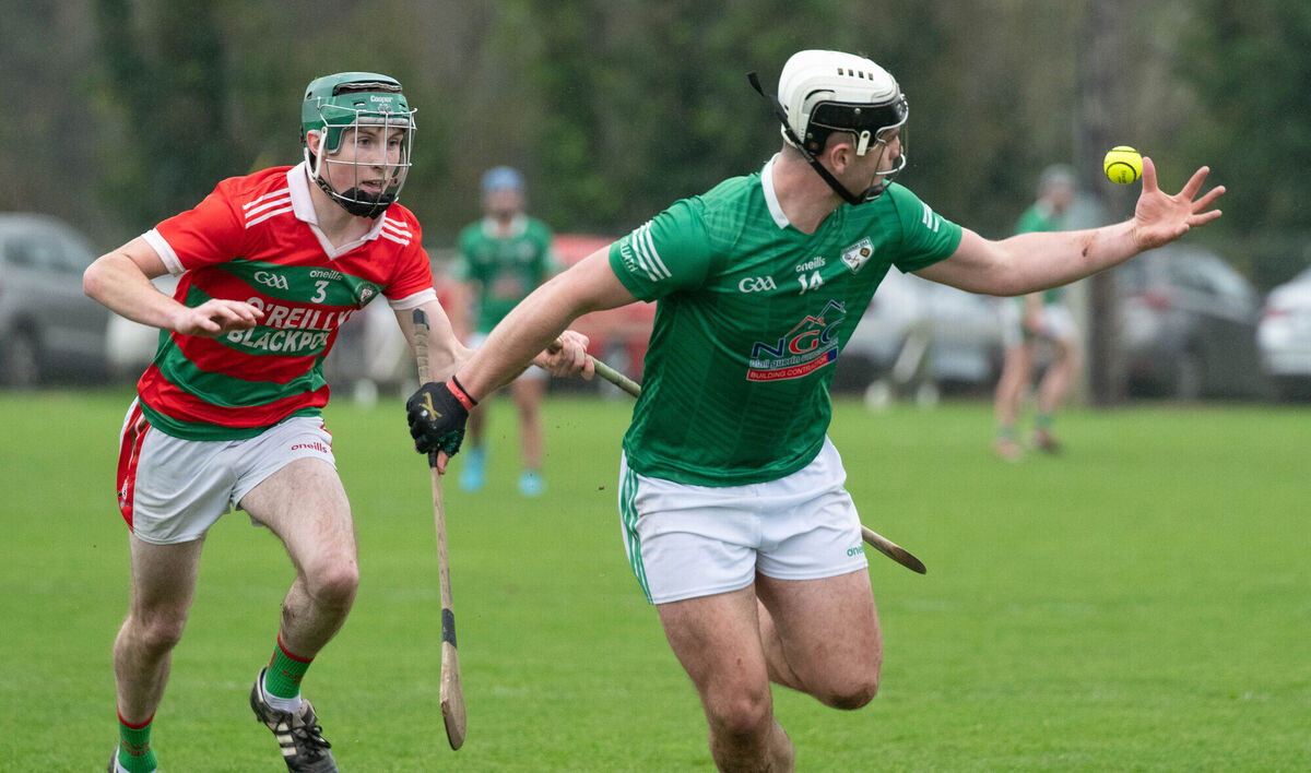 Killeagh's Barry Walsh reaches out for the sliotar ahead of Carraig na bhFear's Felix Murphy during the East Cork JAHC final replay in Castlemartyr last season. Picture: Howard Crowdy
