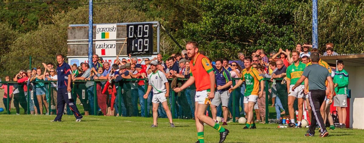 Garnish sideline encouraging their team against Urhan in 2019. Picture: Anne Marie Cronin Photography