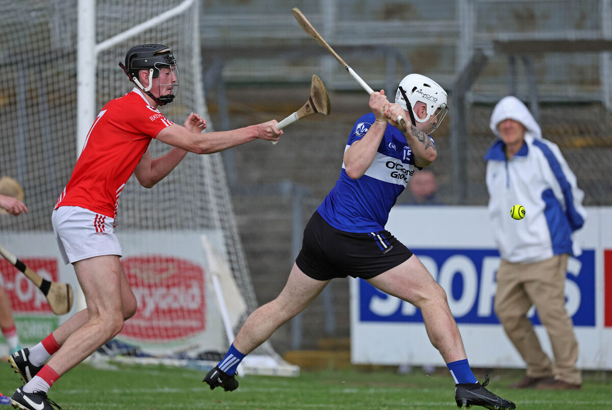  Robert Carroll, Charleville, battles to stop the shot of Shane O'Regan, Sarsfields during the Division 1 HL final last year. Picture: Jim Coughlan.
