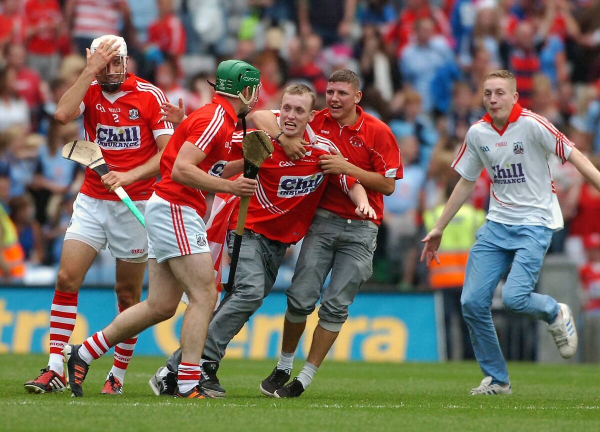 Cork's Pa Cronin and William Egan are hugged by Cork fans after defeating Dublin. Picture: Eddie O'Hare Cork's Pa Cronin and William Egan are hugged by Cork fans after defeating Dublin. Picture: Eddie O'Hare