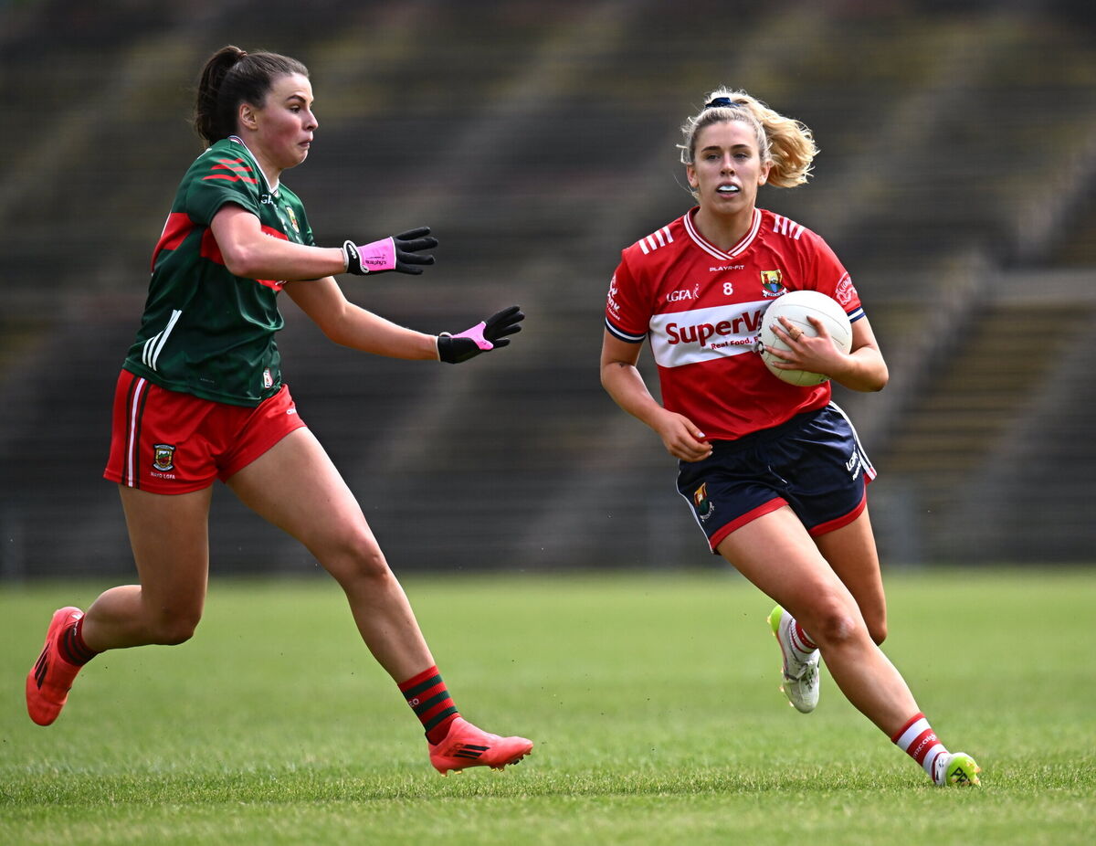 Máire O'Callaghan of Cork gets away from Aoife Geraghty of Mayo during the TG4 All-Ireland Ladies Football Senior Championship Group 2 match between Mayo and Cork at Hastings Insurance MacHale Park in Castlebar, Mayo. Photo by Piaras Ó Mídheach/Sportsfile
