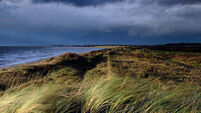 Dunes and an approaching storm at Prestwick, Ayrshire