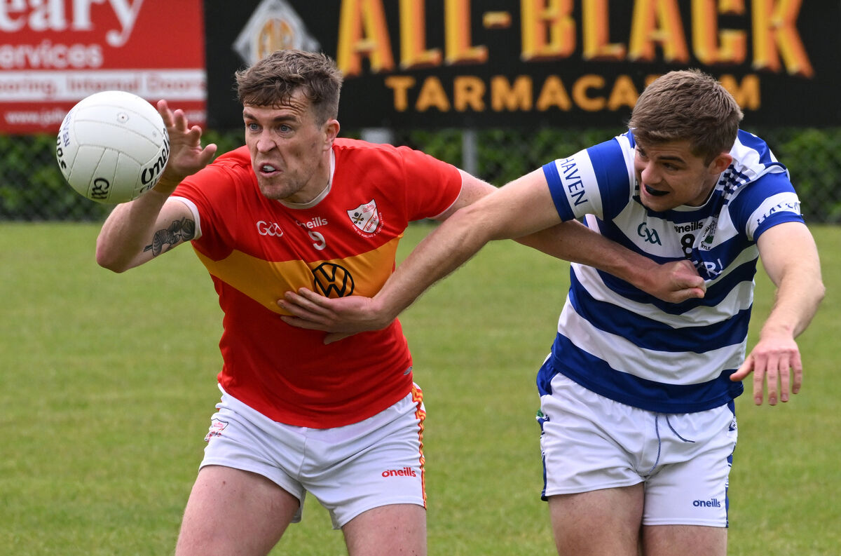 Andrew Whelton, Castlehaven getting in a tackle on Donncha Kelly, Éire Óg in their McCarthy Insurance Group football league division 1 match at Castlehaven. Picture: Dan Linehan Andrew Whelton, Castlehaven getting in a tackle on Donncha Kelly, Éire Óg in their McCarthy Insurance Group football league division 1 match at Castlehaven. Picture: Dan Linehan