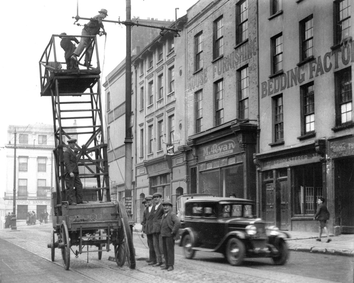 McCurtain Street photographed in 1932. Throwback Thursday readers recalled their memories of the street; the buildings with basements and the cliff running behind the street. 