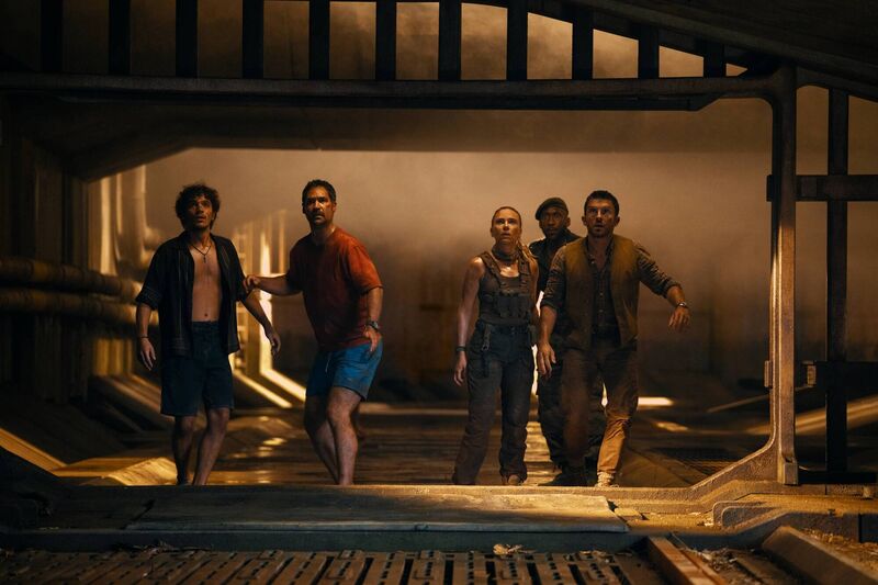 Pictured: Xavier Dobbs (David Iacono), Reuben Delgado (Manuel Garcia-Rulfo), Zora Bennett (Scarlett Johansson), Duncan Kincaid (Mahershala Ali) and Dr. Henry Loomis (Jonathan Bailey). Picture: Jasin Boland/Universal Pictures and Amblin Entertainment. 