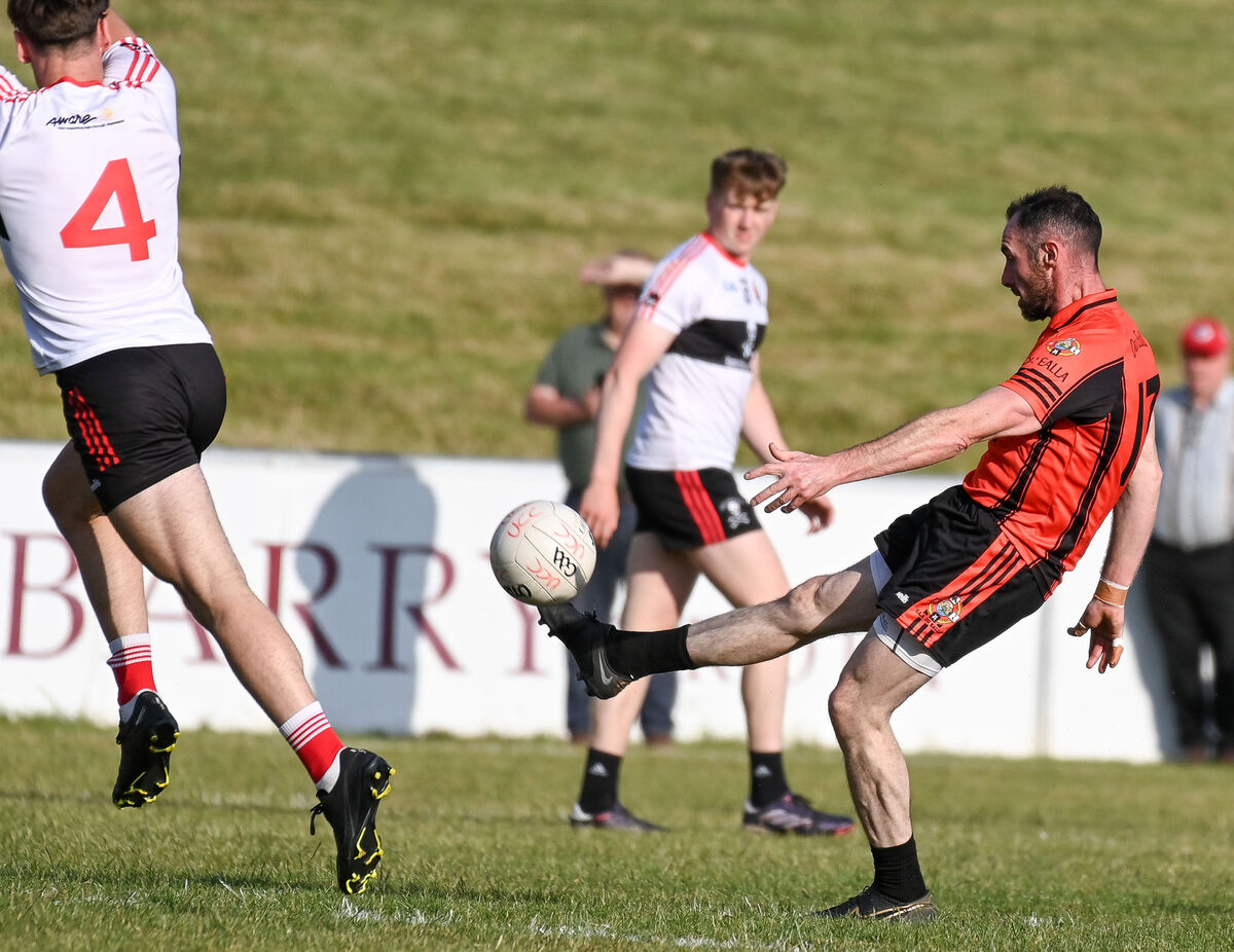 Duhallow's Donncha O'Connor scores a point past UCC's Daragh Murray. Picture: David Keane Duhallow's Donncha O'Connor scores a point past UCC's Daragh Murray. Picture: David Keane