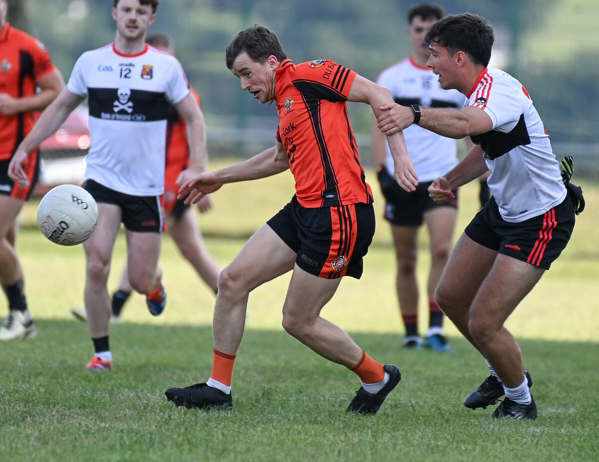 Duhallow's Conor Murphy battles with UCC's Ruairí Bourke. Picture: David Keane Duhallow's Conor Murphy battles with UCC's Ruairí Bourke. Picture: David Keane