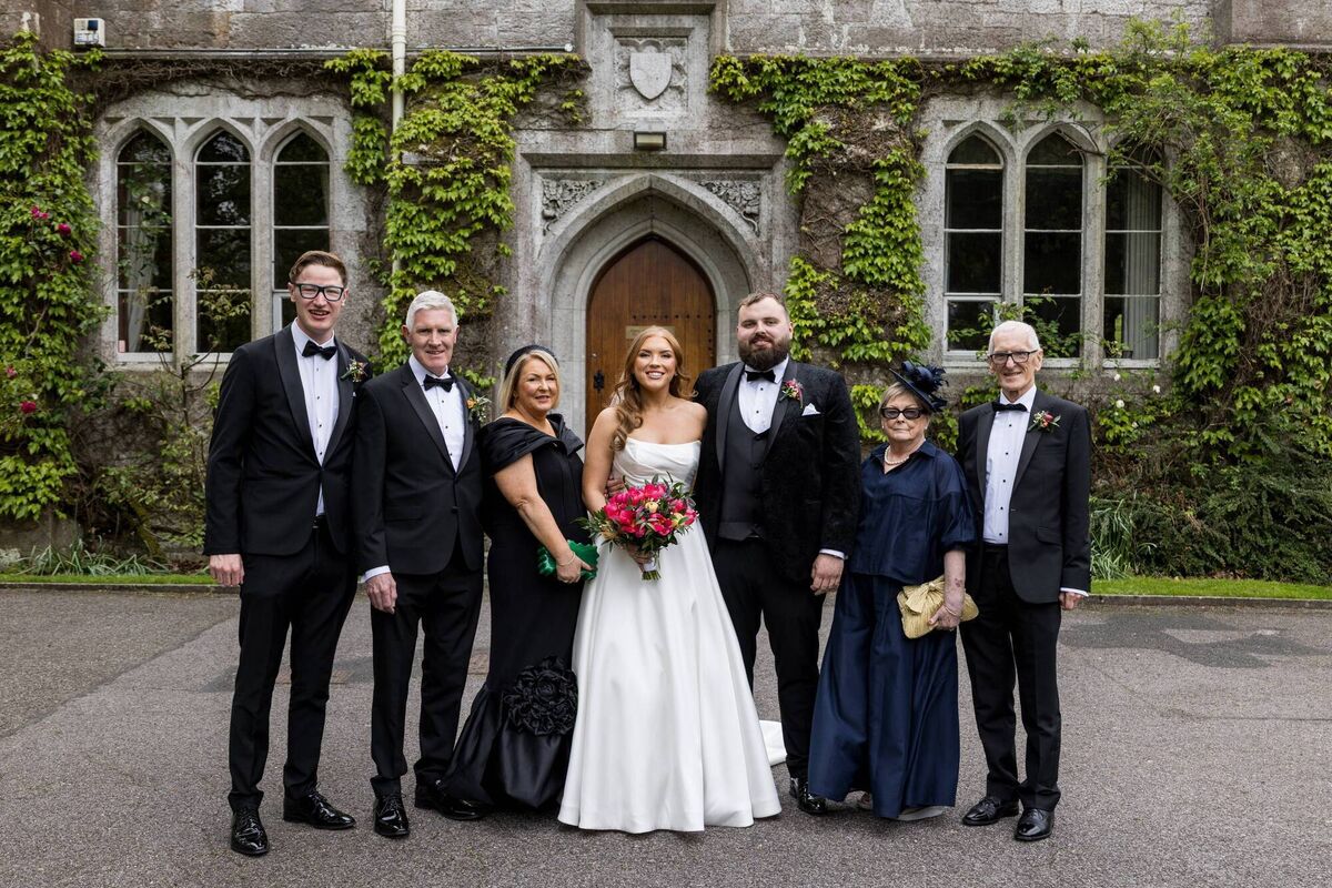 The couple pictured with Laura’s family: Freddie, Barry, June, Laura, James, Heather and Liam. The couple pictured with Laura’s family: Freddie, Barry, June, Laura, James, Heather and Liam.